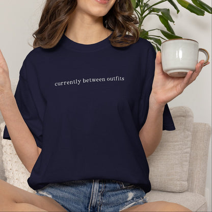 "Currently Between Outfits" T-Shirt