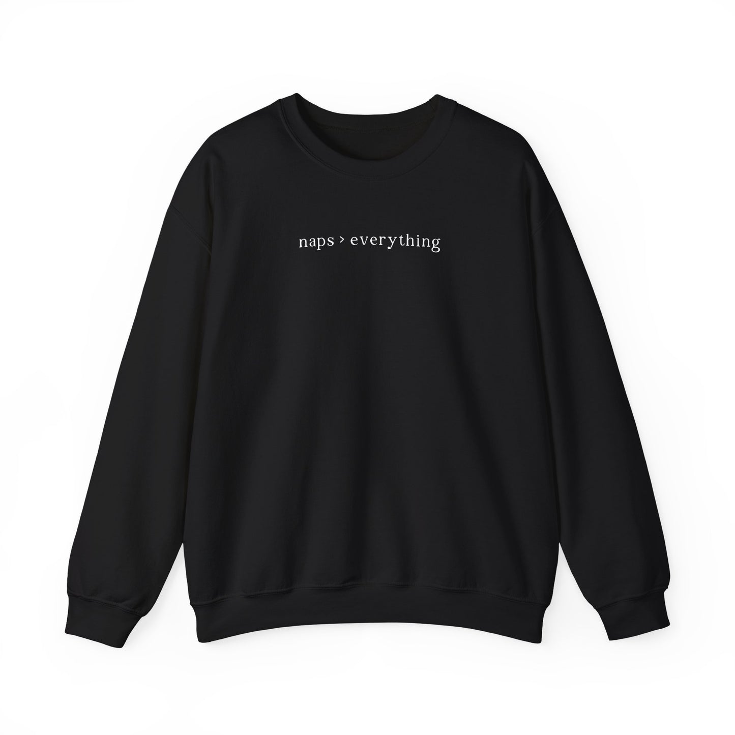 A black oversized sweatshirt featuring minimalist white text across the chest that reads 'naps > everything'. Clean studio product photography on a white background for the Barely Sane clothing collection.
