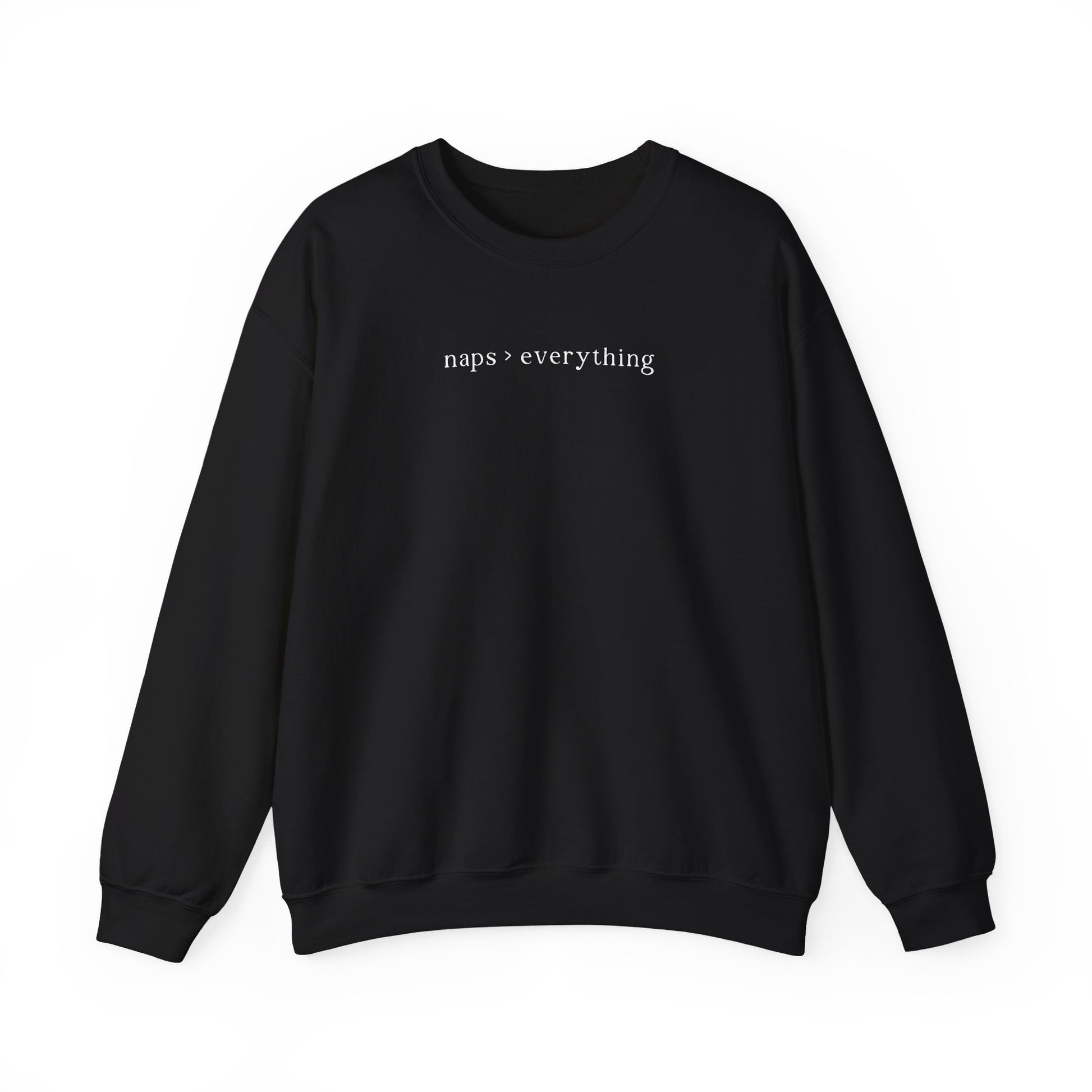 A black oversized sweatshirt featuring minimalist white text across the chest that reads 'naps > everything'. Clean studio product photography on a white background for the Barely Sane clothing collection.