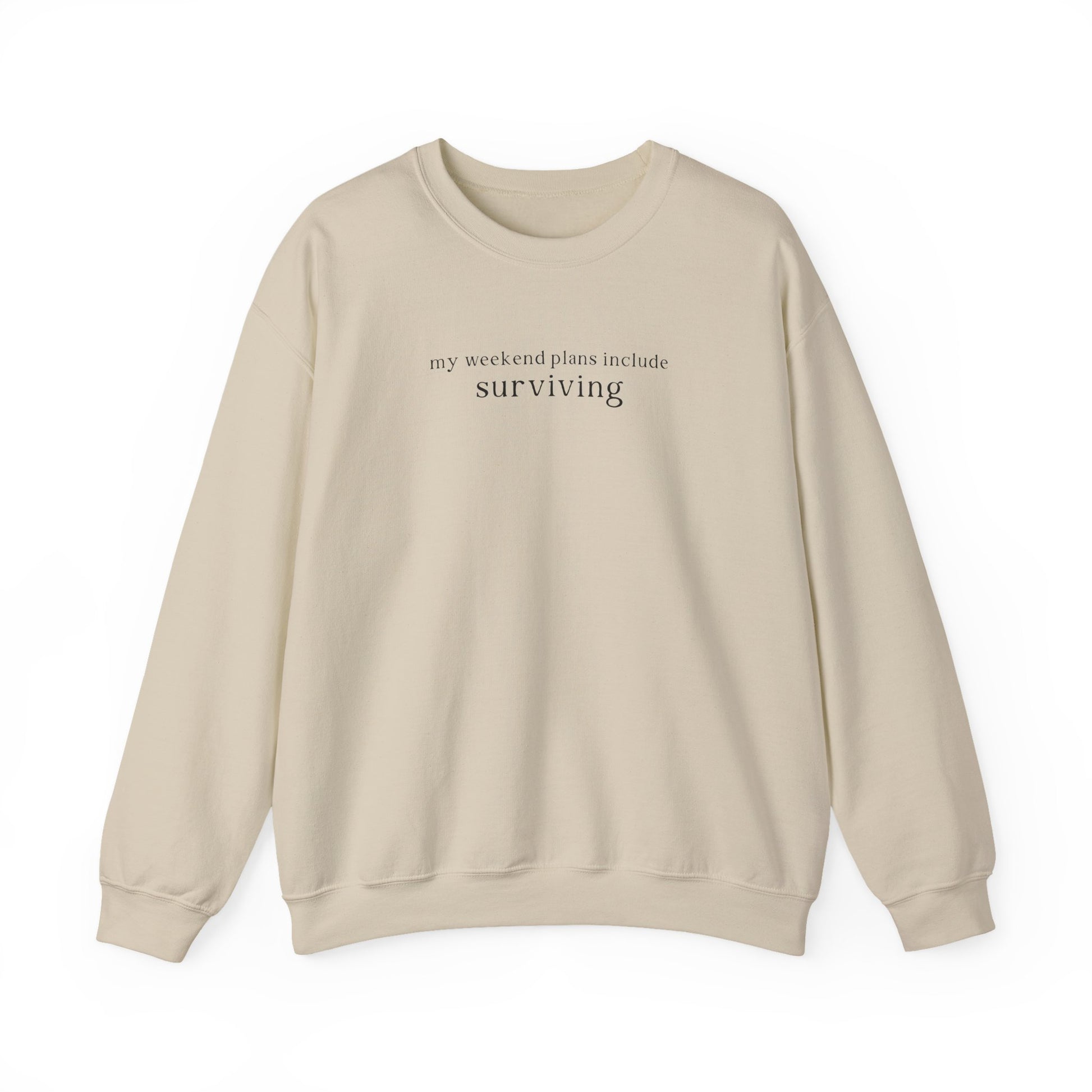 Beige sweatshirt with text 'my weekend plans include surviving' on a white background